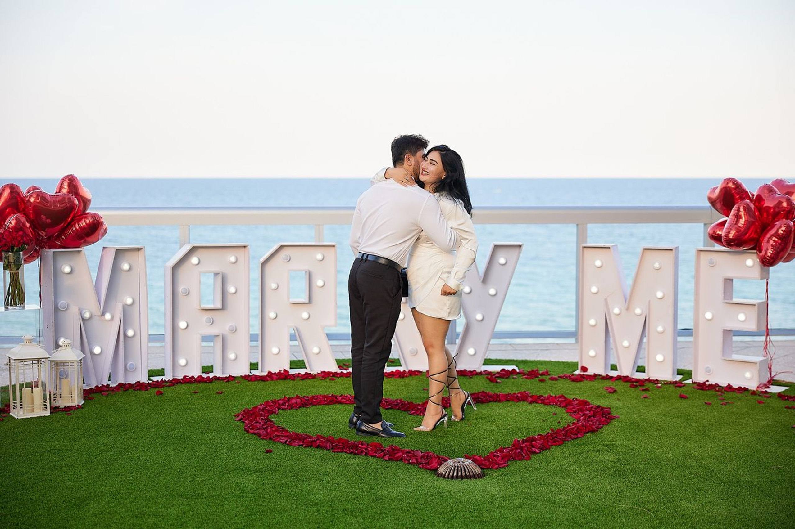 Oceanfront Marry Me setup with a red petal heart