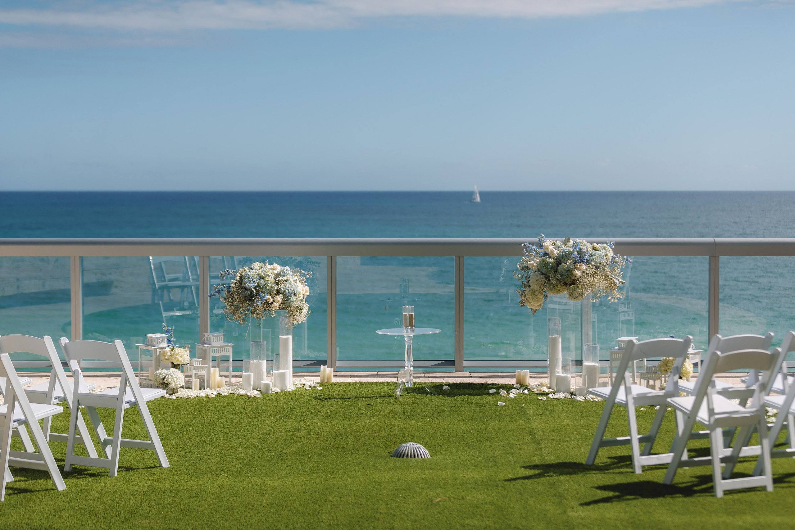 Rooftop ceremony setup overlooking the ocean