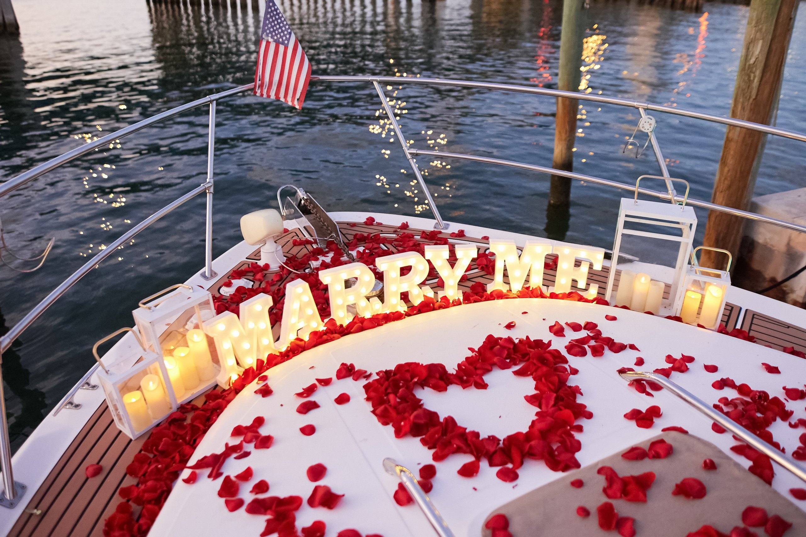 Marry Me letters on the deck of a private yacht