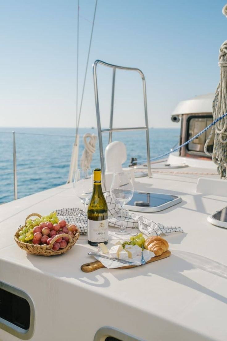 Table for two set on the deck of a sailing yacht