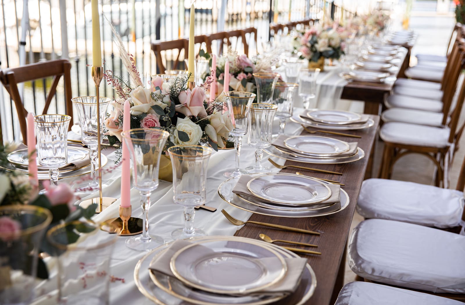 Table set with glassware, candles and flowers