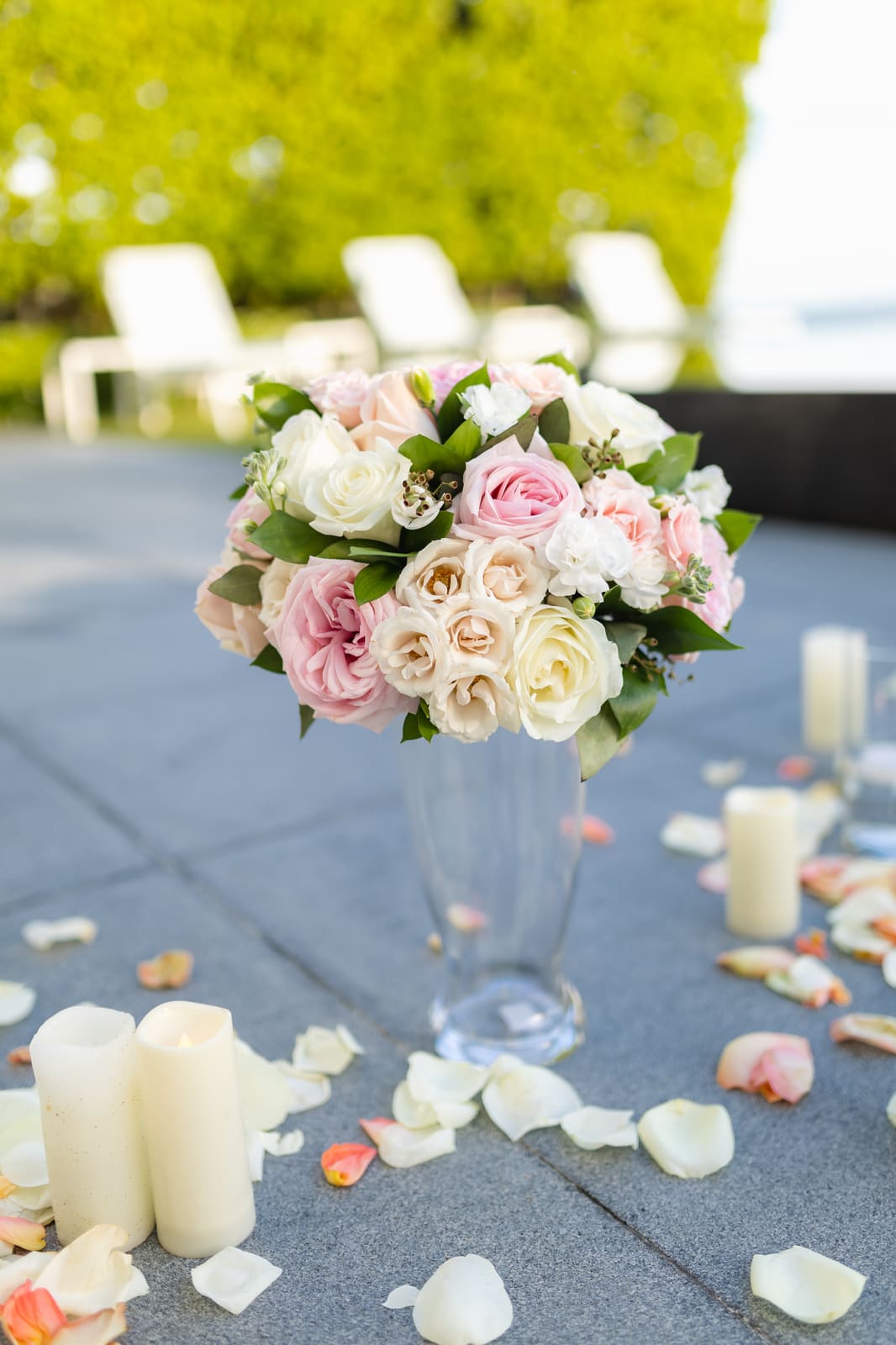 Tall floral centerpiece in a footed vase